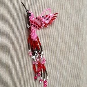 Beautiful red, white and pink hummingbird ornament